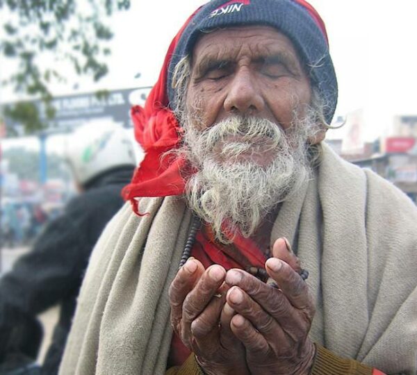 Old Man Praying For Food